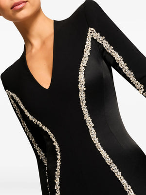 Black dress with silver embellishments on a white background
