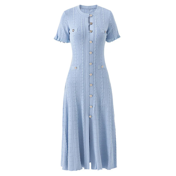Light blue dress with button details on a white background