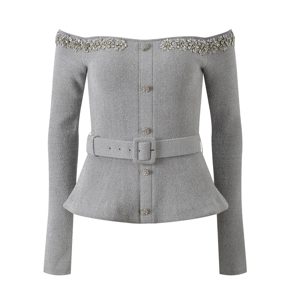 Gray peplum jacket with embellishments on shoulders and belt buckle on a white background