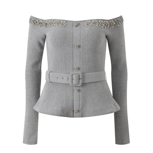 Gray peplum jacket with embellishments on shoulders and belt buckle on a white background