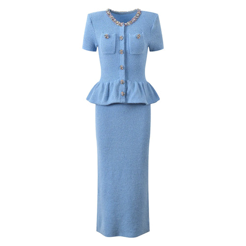 Light blue dress with peplum top and skirt on a white background