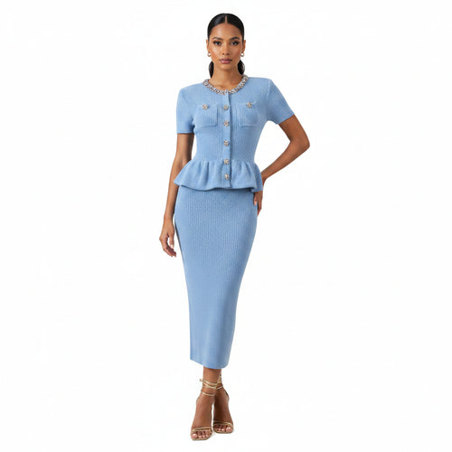 Light blue dress with peplum top and skirt on a white background