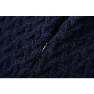 Close-up of dark blue textured fabric with a zipper