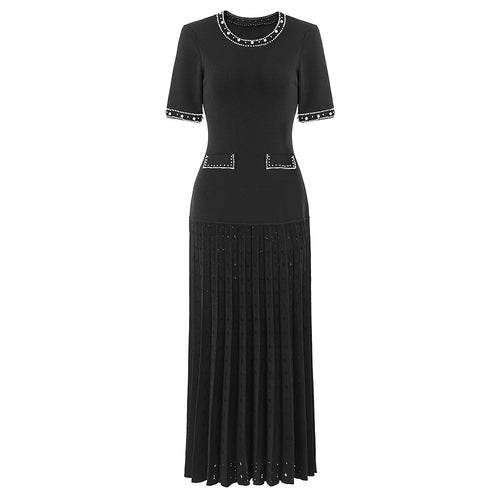 Black dress with decorative elements on a white background