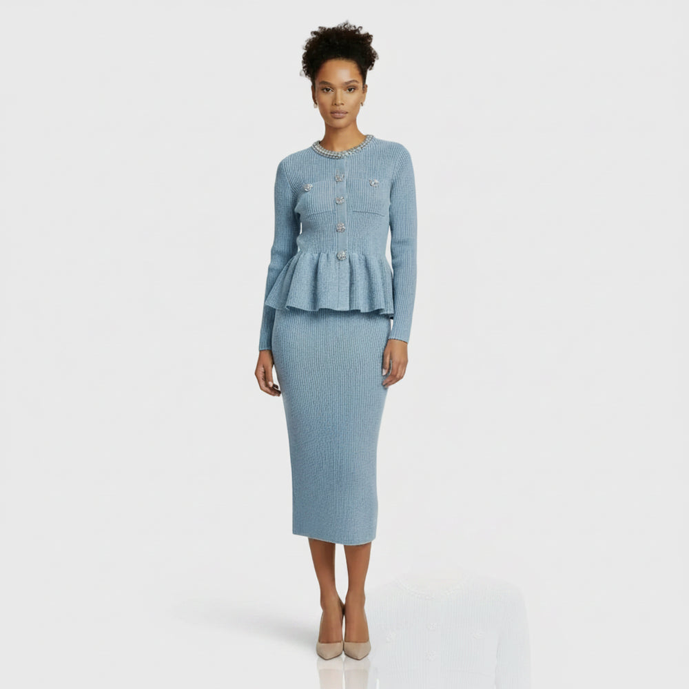 Light blue ribbed sweater with decorative buttons and matching skirt on a white background
