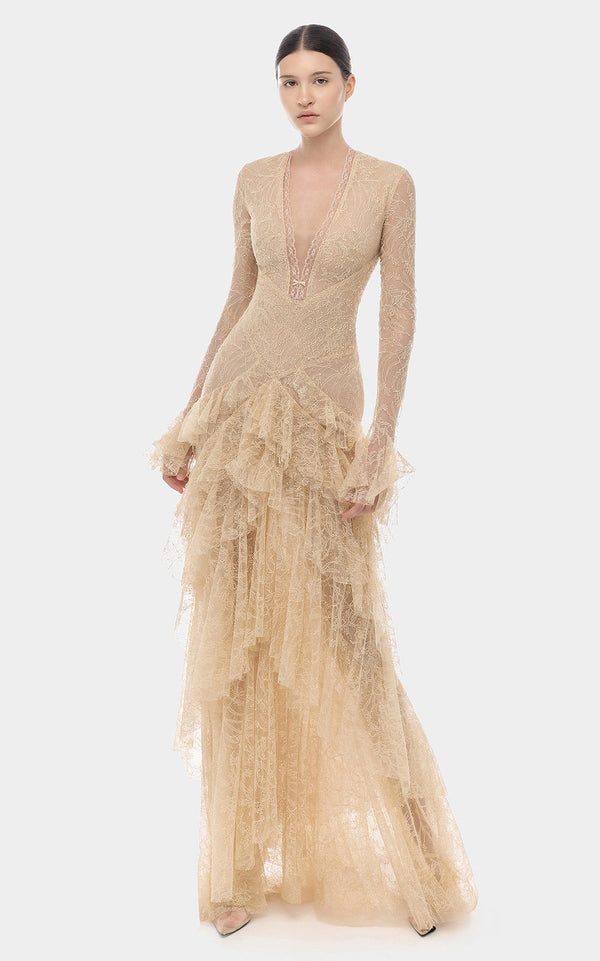 Beige evening gown with intricate detailing on a white background