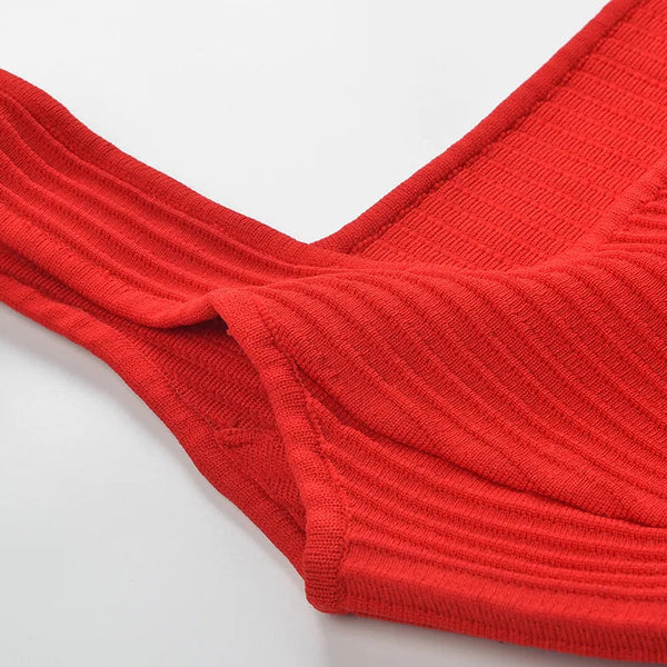 Red ribbed fabric on a white background