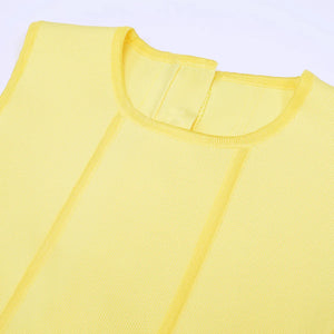 Close-up of a yellow sleeveless top with a plain background