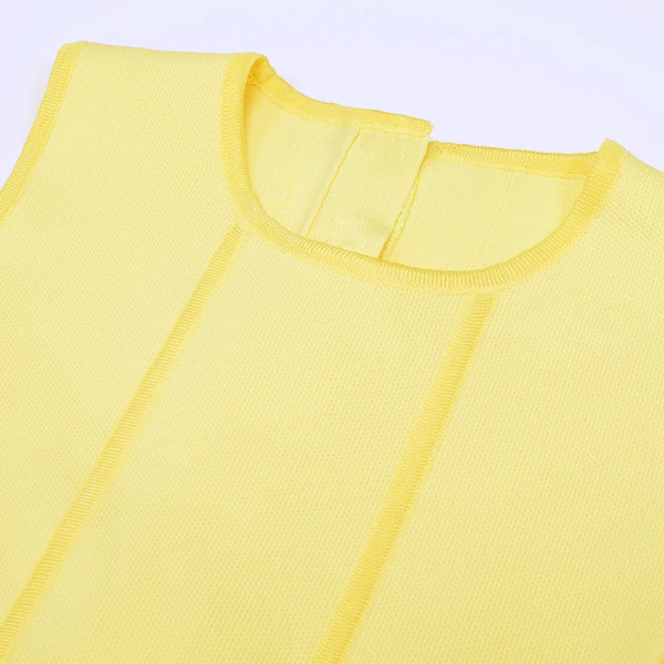 Close-up of a yellow sleeveless top with a plain background