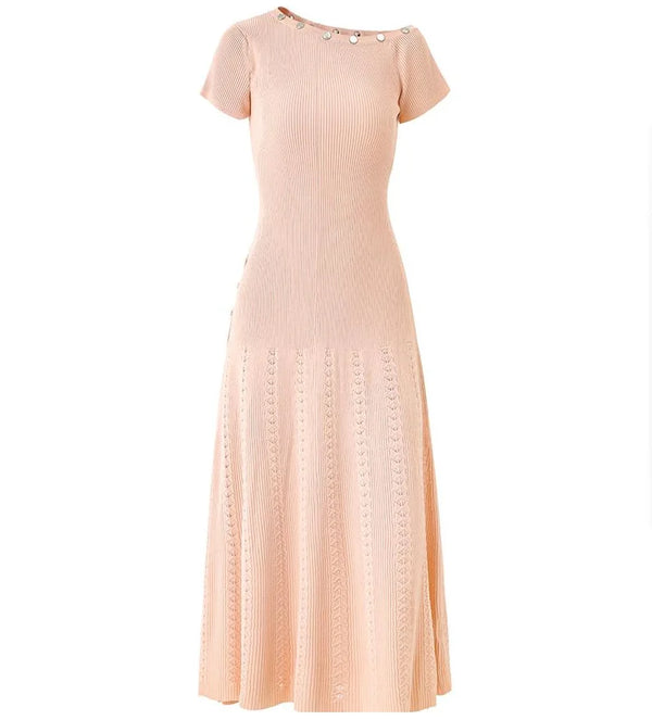 Pink ribbed dress on a white background