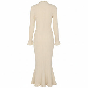 Beige ribbed dress with long sleeves on a white background