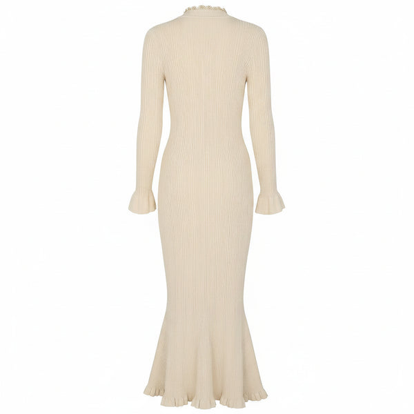Beige ribbed dress with long sleeves on a white background
