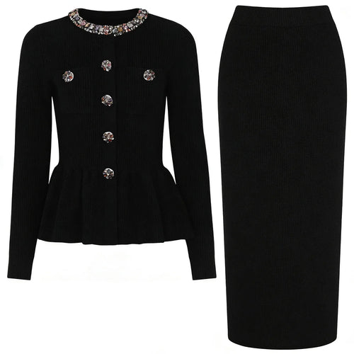 Black jacket with decorative buttons and a black pencil skirt on a white background