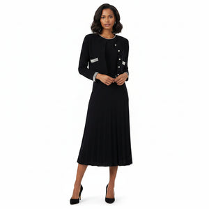 Black jacket and dress set with decorative buttons on a white background