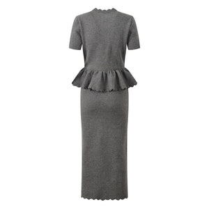 Gray dress with peplum detail on a white background