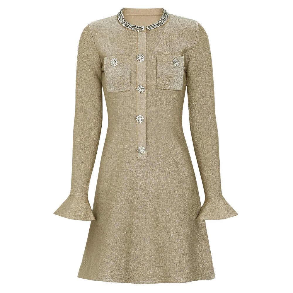 Beige dress with embellishments on a white background