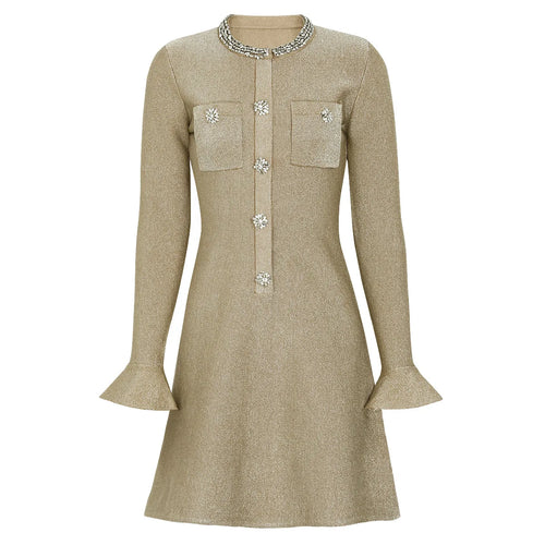 Beige dress with embellishments on a white background