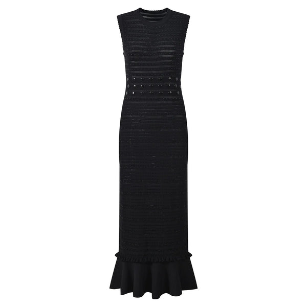 Black dress with ruffled hem on a white background