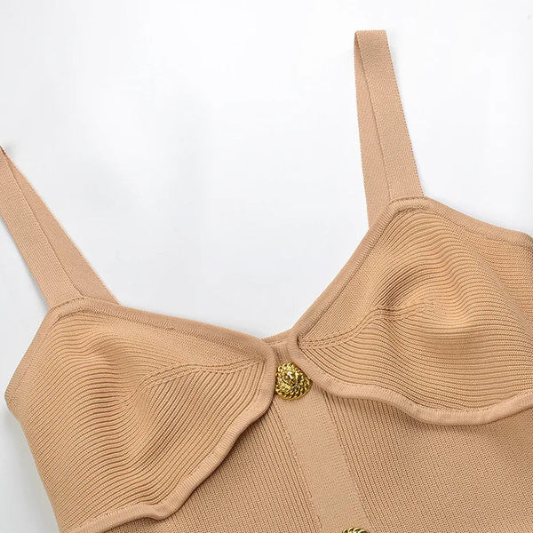 Beige bra with a gold clasp on a white background