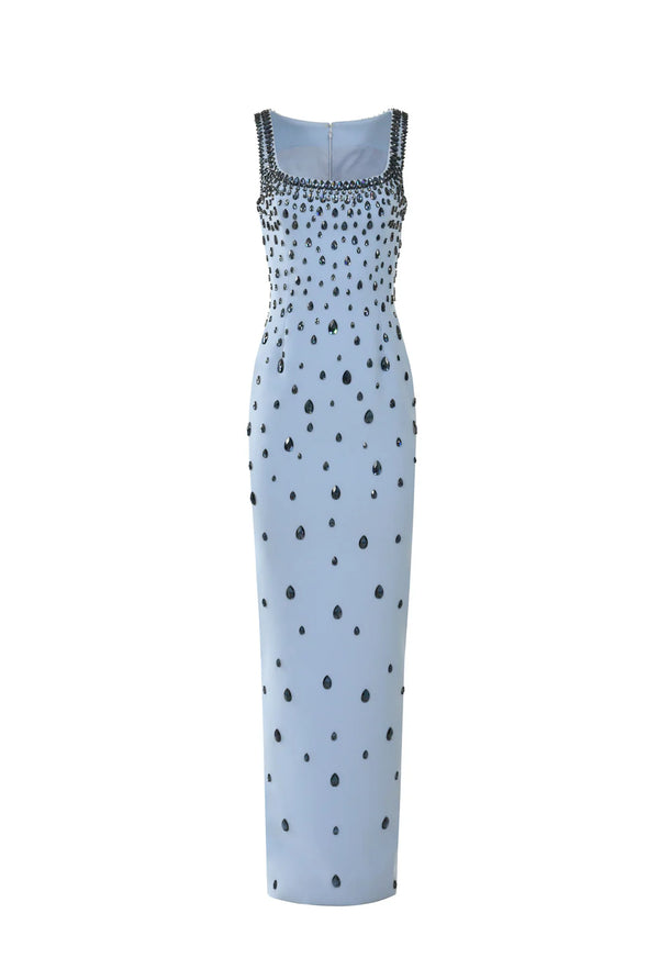 Long dress with polka dot pattern on a white background