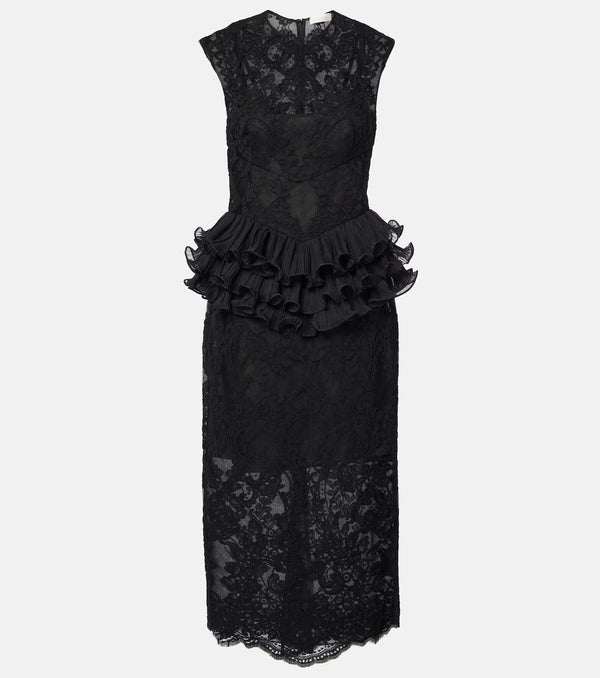 Black lace dress with peplum detail on a white background
