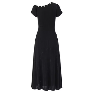Black dress with decorative elements on a white background