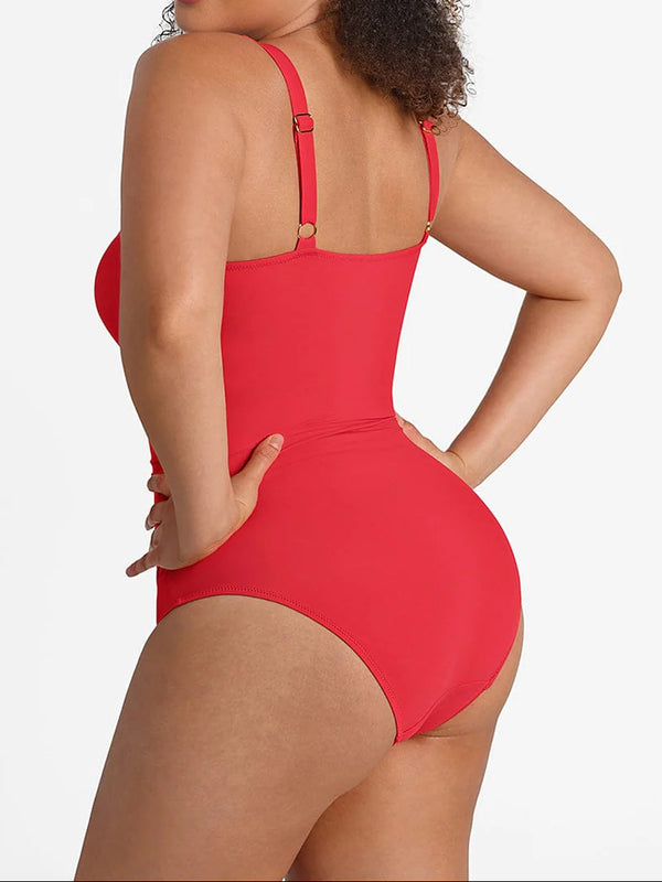 Red swimsuit worn by a person on a white background