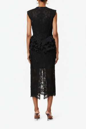 Black lace dress with ruffled details on a white background